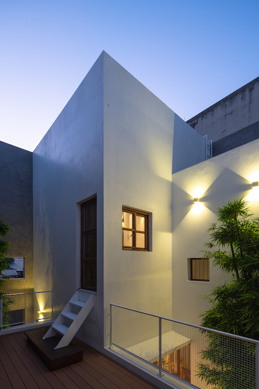 Modern Vietnamese house by AHL Architects is built around three outdoor ...